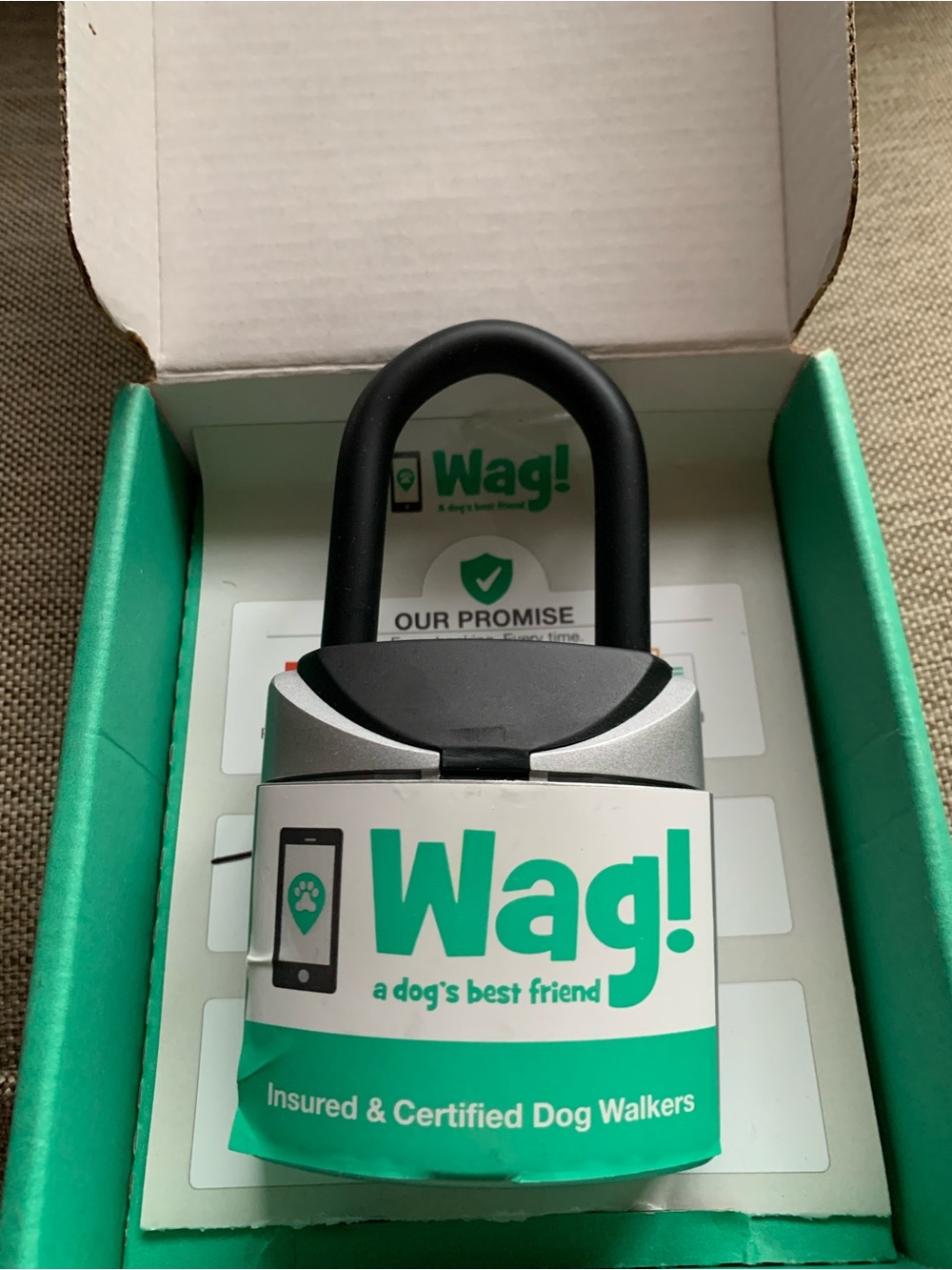 Wag branded combination lock box to store house keys for dog walkers